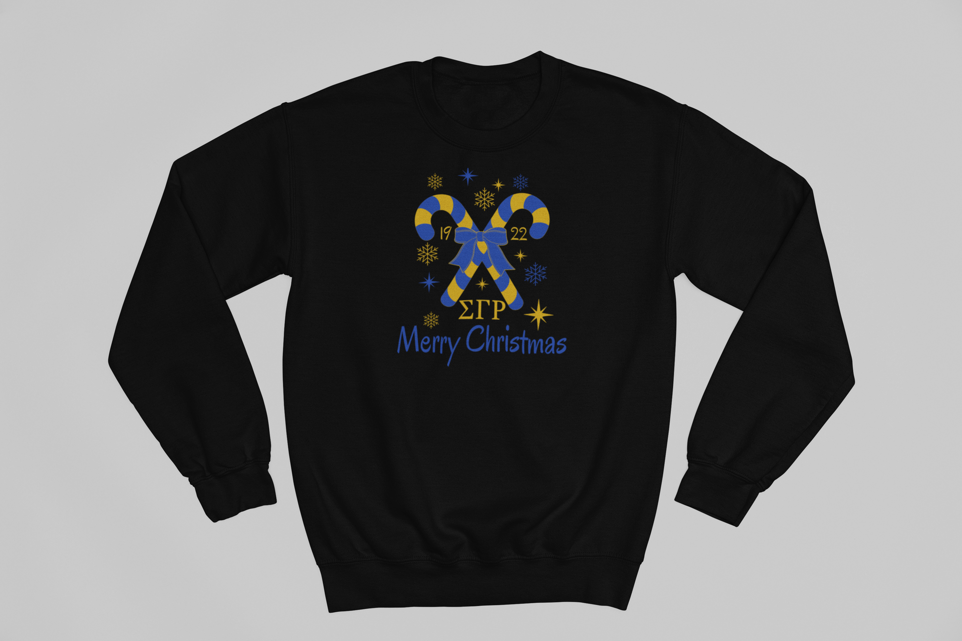 Black sweatshirt with Sigma Gamma Rho Candy Cane Christmas themed design and text on a gray background